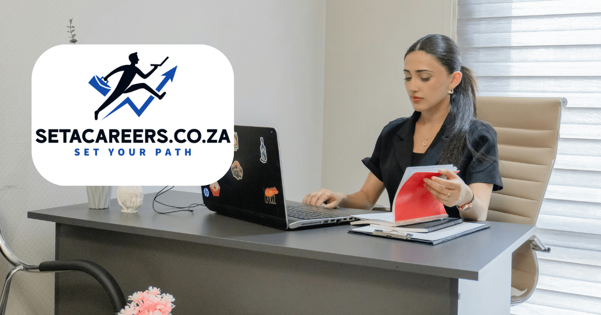 Young IT intern working on a laptop in a modern tech office during the SITA Internship Programme.