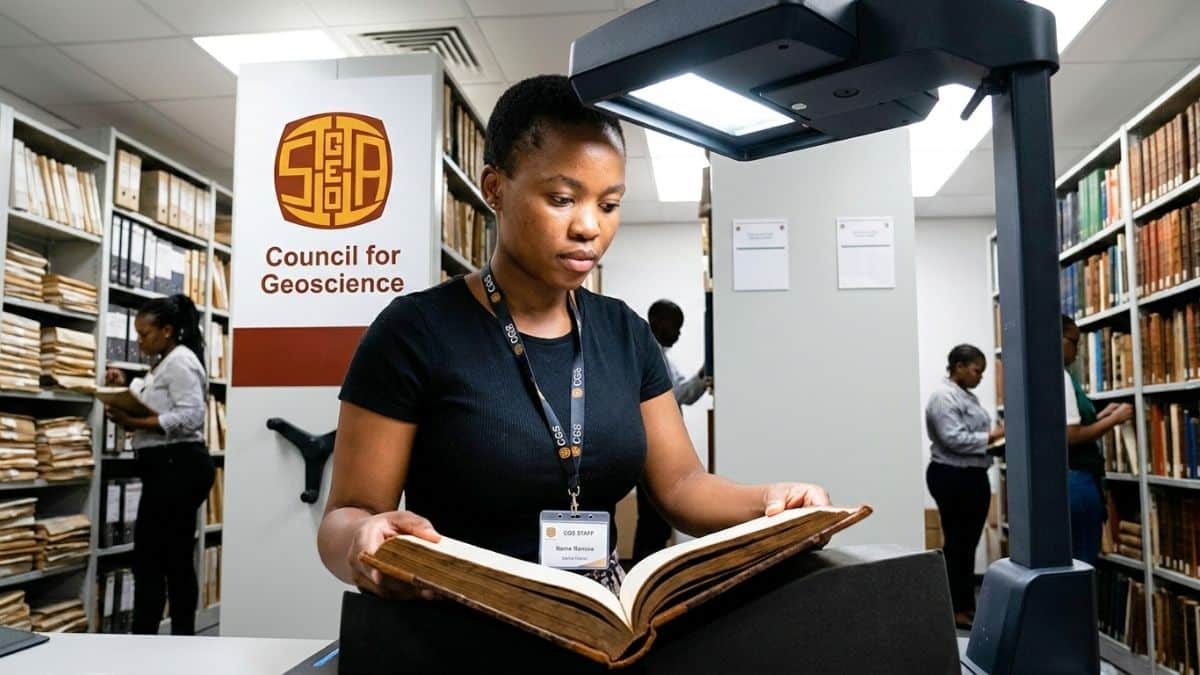 CGS library intern digitising documents in South Africa