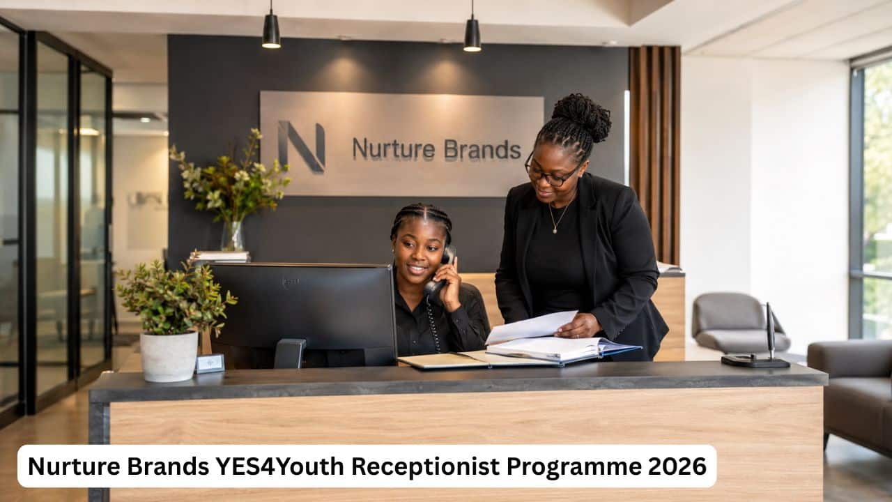 Young South African receptionist participant answering calls and assisting visitors inside a professional office reception area.