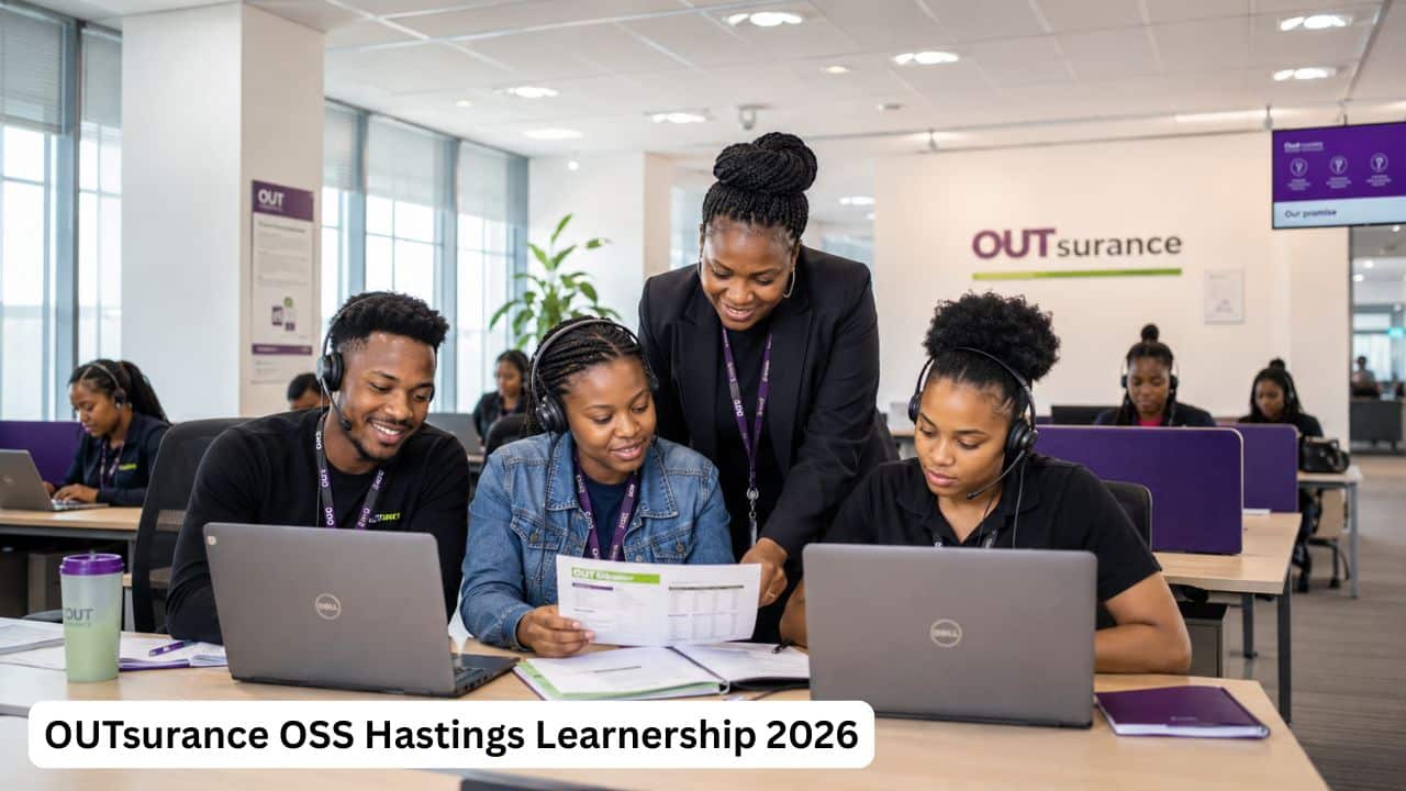 Young South African call centre learners reviewing insurance training materials inside an OUTsurance office.