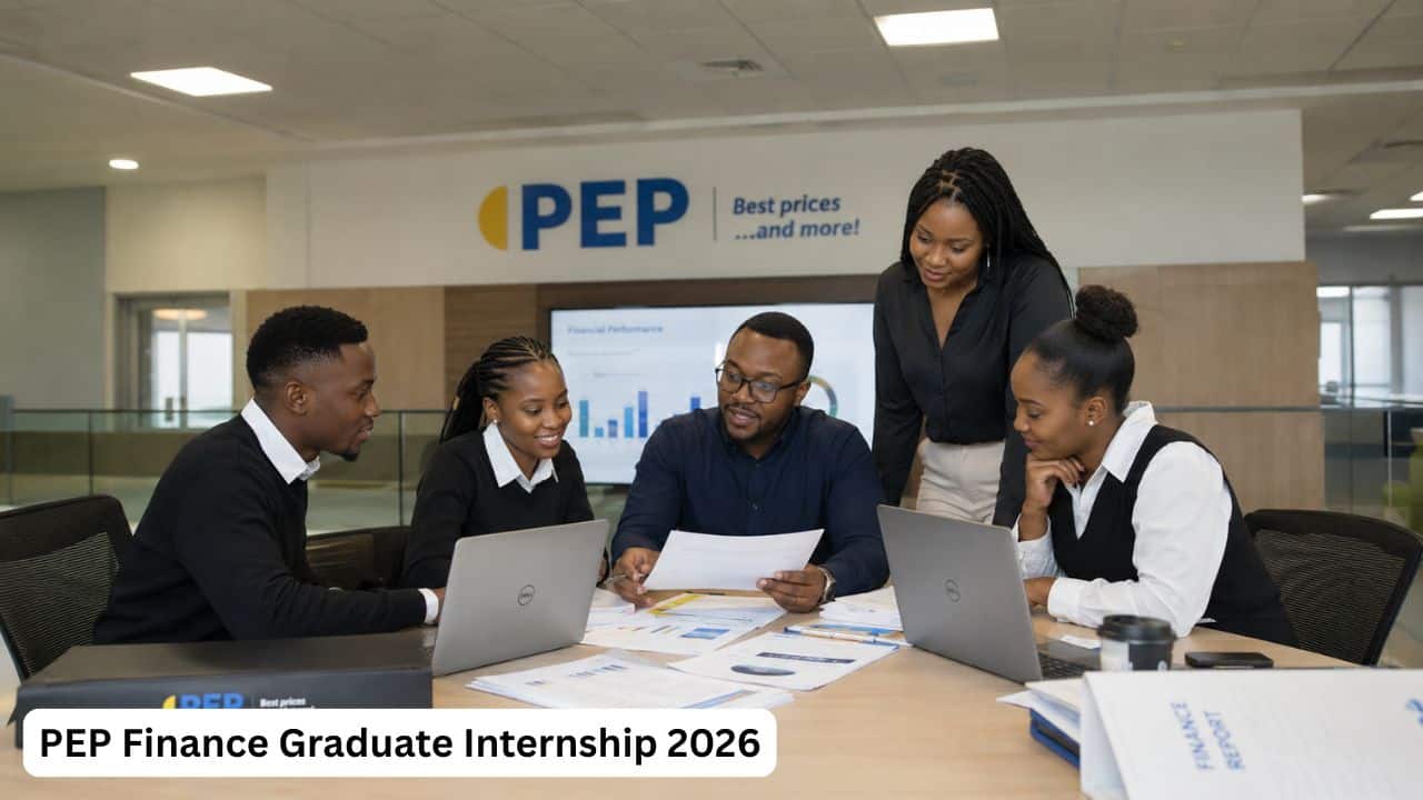 Young South African finance interns reviewing accounting documents during a PEP Finance Graduate Internship.
