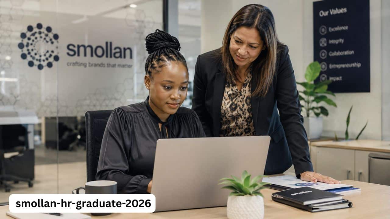 Young South African HR graduate reviewing reports during a Smollan graduate opportunity.