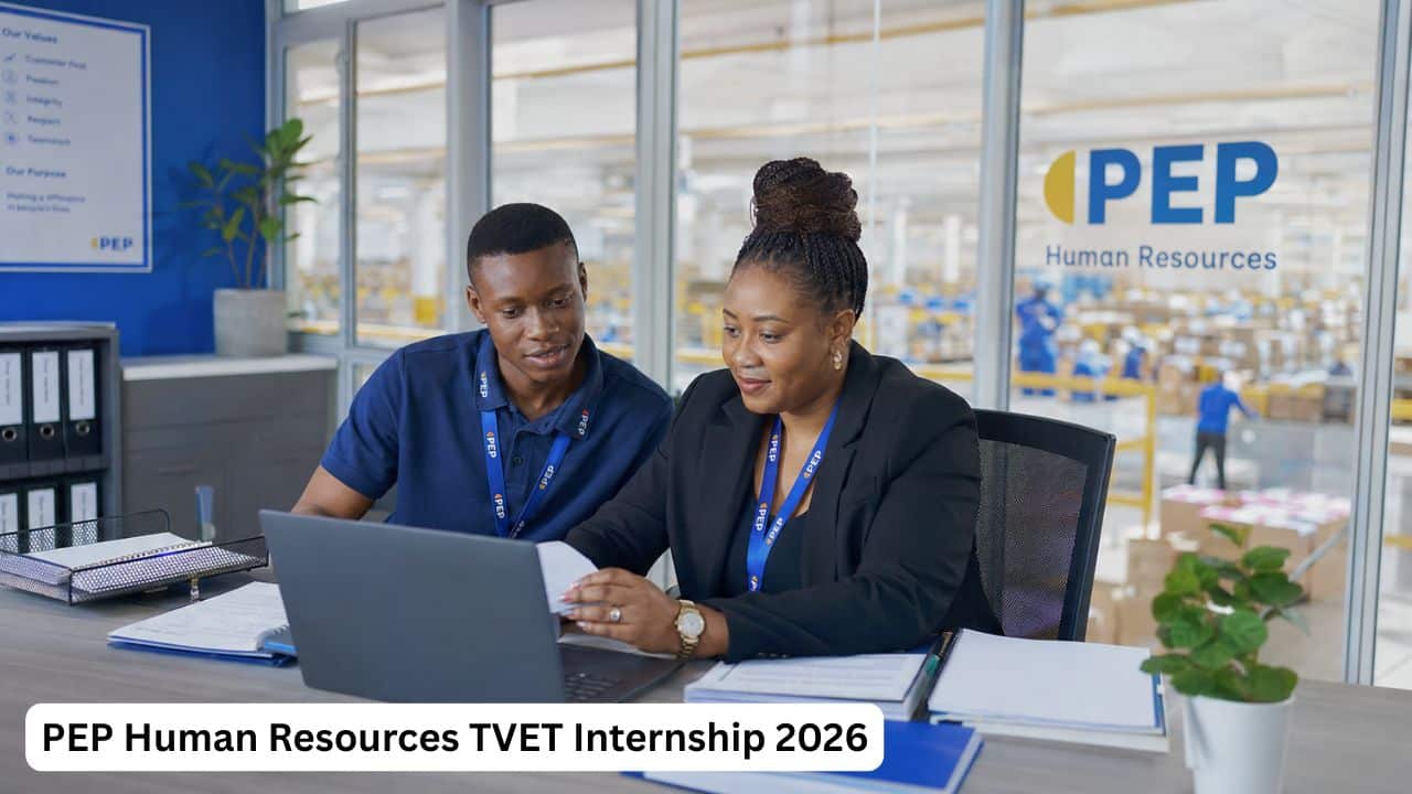 South African PEP Human Resources intern reviewing employee documents with a supervisor